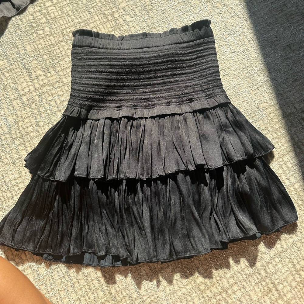 Black ruffle mini skirt